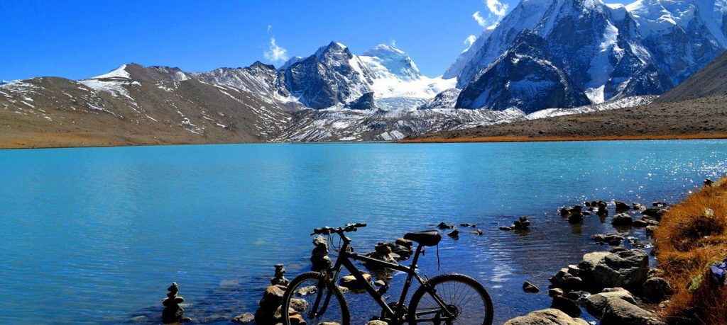 Snow clad mountains enclosing Sikkim