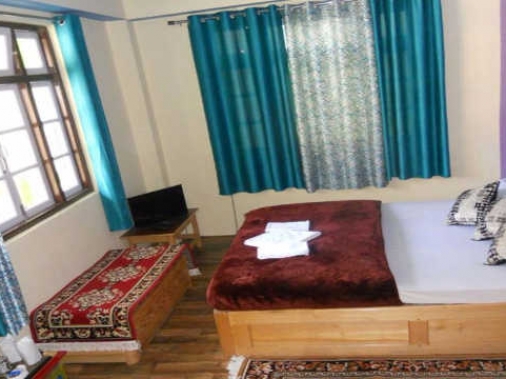 Book Non-AC DELUXE Ground Floor Triple Bed (Nonview) at Floret Hotels and Resorts Lachung, Sikkim