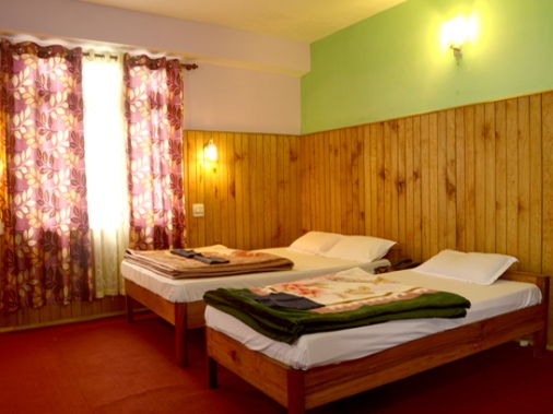 Book Non-AC Normal Triple Room at The Holiday Inn, Sikkim