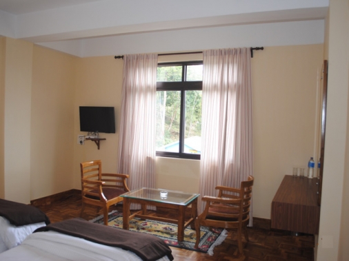 Book Non-AC Deluxe Rooms at Pine Haven Resorts, Darjeeling